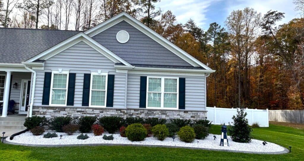 Front yard landscape edging with decorative concrete curbing in Great Falls MD