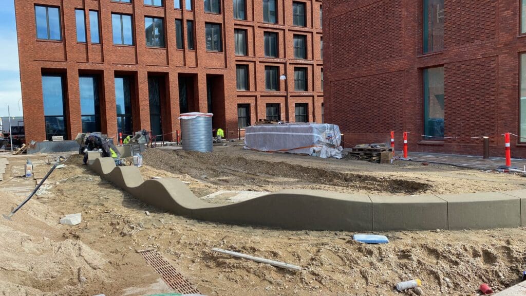 Concrete landscape curbing installation for commercial property in Potomac MD