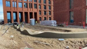 Concrete landscape curbing installation for commercial property in Potomac MD